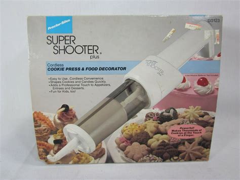 Shape dough into 1 14-inch balls; roll in sugar. . Super shooter cookie press